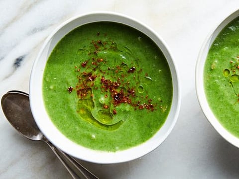 Lemony spinach soup with farro, in New York, Dec. 30, 2019. Loaded with greens and other vegetables, plus farro and creamy potato, this soup walks the line between healthful and heavy. Food Stylist: Monica Pierini. (Linda Xiao/The New York Times)