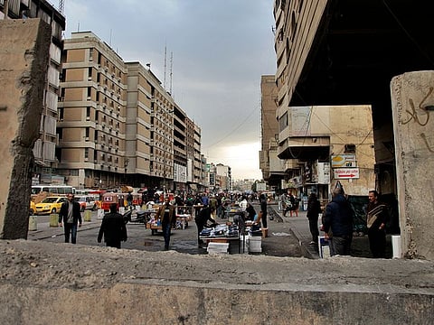 Protesters stage a sit-in at Tahrir Square in Baghdad, Iraq, Wednesday, Jan. 8, 2020.