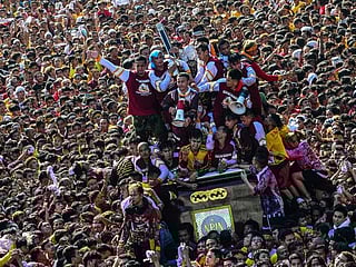 Filipino Catholics parade centuries-old 'Black Nazarene'