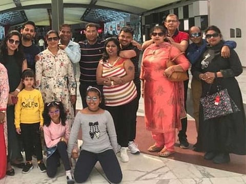 Nem Chand Jain, third from right, with his wife and other members of the tourist group.