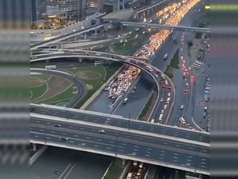 Vehicles stalled in the flooded part of the Dubai Mall interchange on Saturday following heavy rains in Dubai.