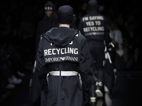 Models wear creations as part of the  Emporio Armani men's Fall-Winter 2020/21 collection, that was presented in Milan, Italy, Saturday, Jan. 11, 2019. (AP Photo/Luca Bruno)