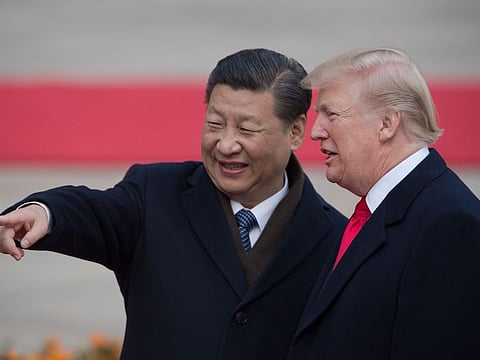 China's President Xi Jinping (left) and US President Donald Trump