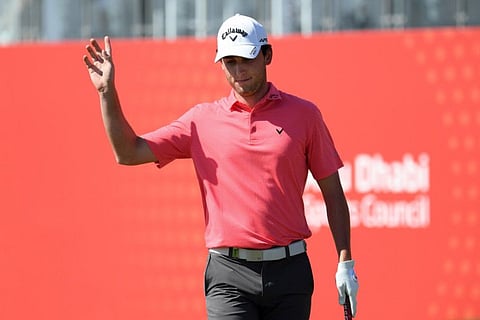 Renato Paratore of Italy in action at the 18th hole during first round of the Abu Dhabi HSBC Championship at Abu Dhabi Golf Club on Thursday.