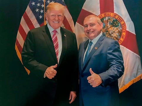 Lev Parnas with Trump in Florida.