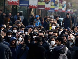 Anti-government protesters attend a demonstration at the Tehran University campus.  File photo taken on. January 14, 2020. 