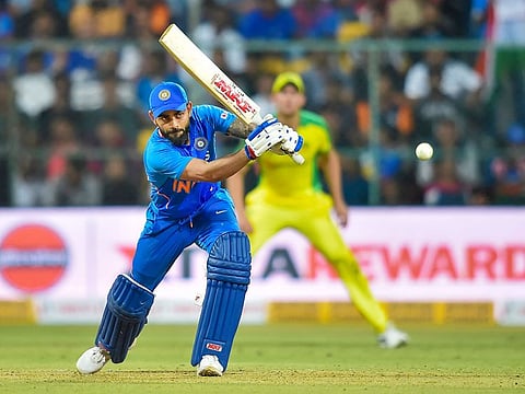 India's Virat Kohli plays a shot during the third and final ODI cricket match against Australia, at Chinnaswamy Stadium in Bengaluru, Sunday, Jan. 19, 2020. 