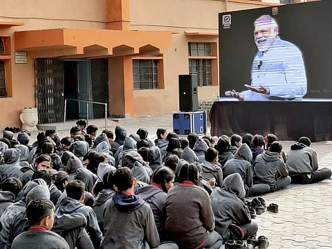 Students of Kendriya vidyalaya, Delhi watching 'Parisksha pe charcha 2020', where Prime minister Narendra Modi is interacting with school students, in New Delhi on Monday. 
