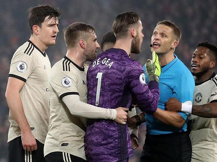 An angry David de Gea shouts at the referee during the match between Liverpool and Manchester United.