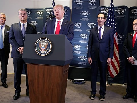 U.S. President Donald Trump holds a news conference next to White House National Security Adviser Robert O'Brien, Director-General of World Trade Organization Roberto Azevedo, U.S. Treasury Secretary Steven Mnuchin and White House economic advisor Larry Kudlow, at the 50th World Economic Forum (WEF) in Davos, Switzerland, January 22, 2020.