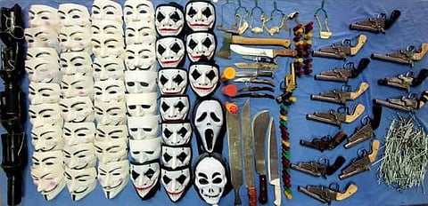 Photos released Wednesday by the Egyptian Interior Ministry showing weapons and masks seized in possession of Brotherhood-linked suspects planning terror attacks in the country.