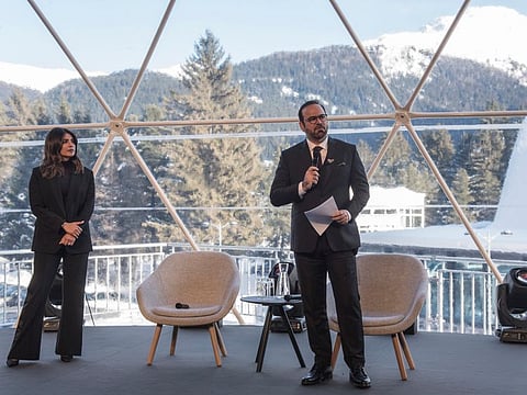 Mohammad Abdullah Al Gergawi, UAE Minister of Cabinet Affairs and Future, speaks in Davos as Priyanka Chopra looks on