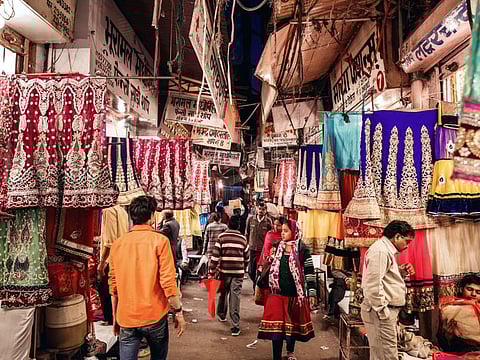 Despite the mushrooming of air-conditioned malls, the good old street bazaars continue to draw a huge number of customers.