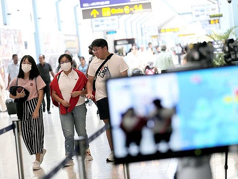  Passengers have their temperature scanned following the new coronavirus outbreak in China.