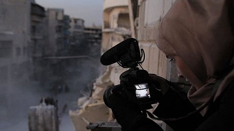 Waad al-Kateab films the ruins of a building destroyed by bombing in besieged east Aleppo. 