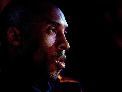 February 26, 2010: Los Angeles Lakers' Kobe Bryant sits on the bench during player introductions before playing against the Philadelphia 76ers in an NBA basketball game in Los Angeles.