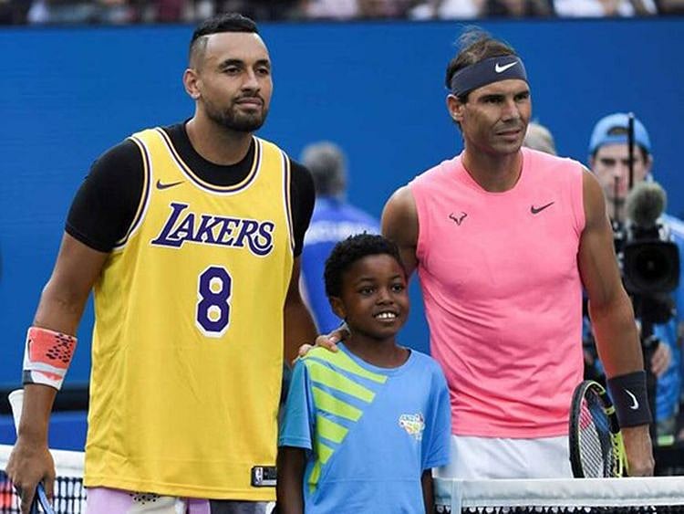 Nick Kyrgios in a Lakers top before his match with Rafael Nadal.