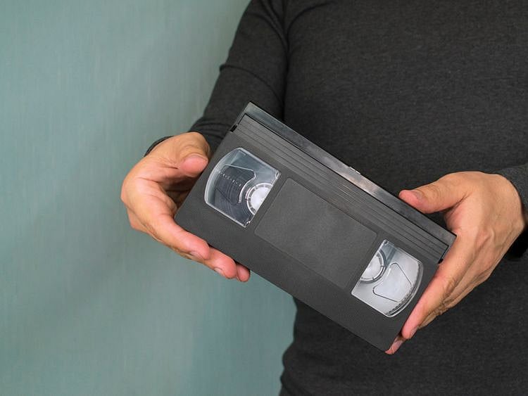 OPN MAN WITH VHS-1580124691174