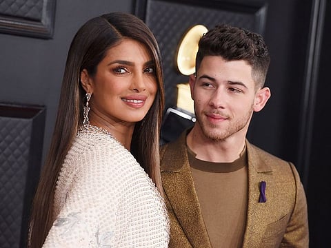 Priyanka Chopra, left, and Nick Jonas arrive at the 62nd annual Grammy Awards at the Staples Center on January 26, 2020, in Los Angeles. 