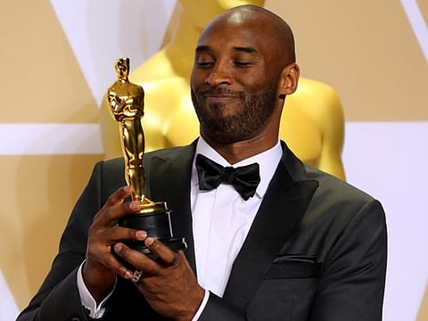 Kobe Bryant with Best Animated Short Film Award for "Dear Basketball".