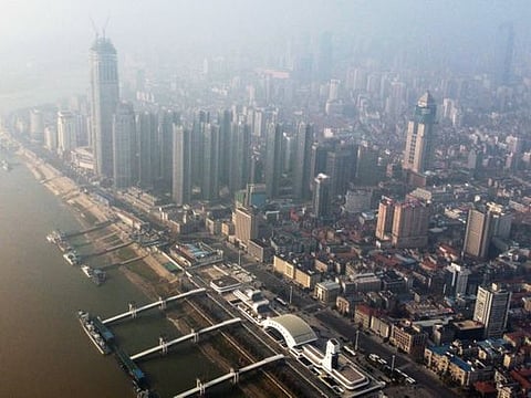 An aerial view shows residential and commercial buildings of Wuhan in China's central Hubei province on January 27, 2020, amid a deadly virus outbreak in the city.