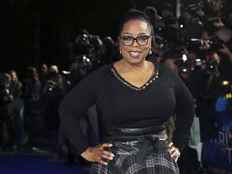 Oprah Winfrey poses for photographers upon arrival at the premiere of the film 'A Wrinkle In Time' in London, Tuesday, March 13, 2018.