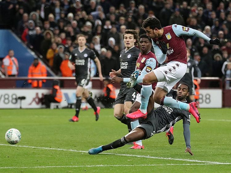 Aston Villa's Trezeguet scores their second goal against Leicester City in the League Cup. 