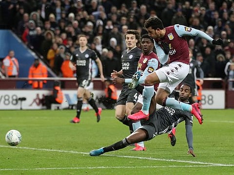 Aston Villa's Trezeguet scores their second goal against Leicester City in the League Cup. 