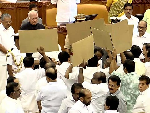 United Democratic Front (UDF) MLAs block Kerala Governor Arif Mohammad Khan as he arrives in the assembly for the budget session of the state assembly in Thiruvananthapuram on Wednesday.
