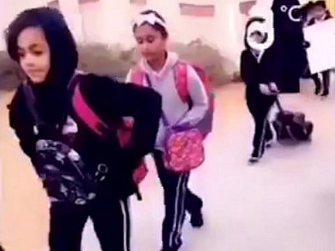 Video of the teacher welcoming pupils to the school in Al Ain  