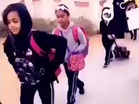 Video of the teacher welcoming pupils to the school in Al Ain  
