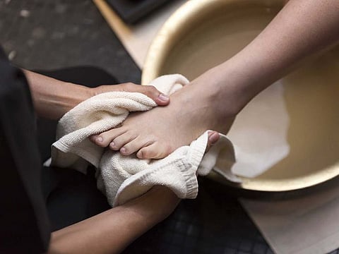A priest in Kerala washed the feet of a parishioner following an altercation