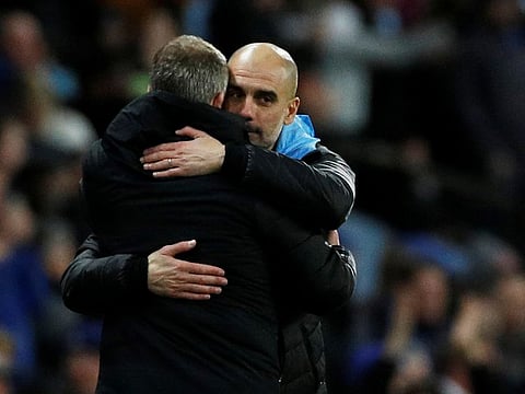 Manchester United manager Ole Gunnar Solskjaer with Manchester City manager Pep Guardiola after the match.