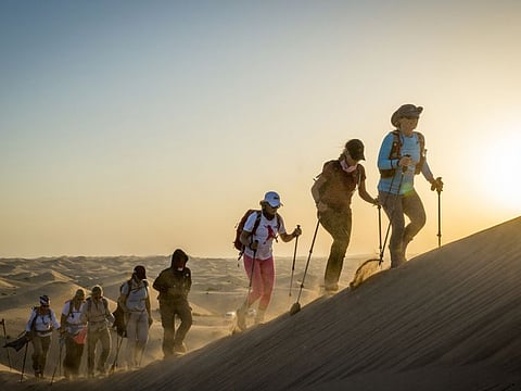 Climbing a ridge at sunrise