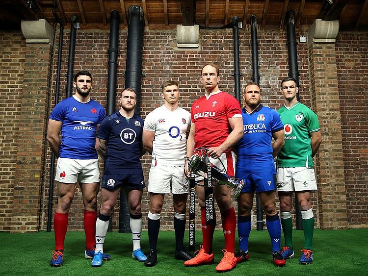 Team captains pose for a photo with the Six Nations Trophy, left to right, France's Charles Ollivon, Scotland's Stuart Hogg, England's Owen Farrell, Wales' Alun Wyn Jones, Italy's Luca Bigi and Ireland's Jonathan Sexton during the Six Nations launch.