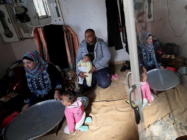 2020-02-03T130522Z_1759088045_RC21TE990638_RTRMADP_3_ISRAEL-PALESTINIANS-ECONOMY-MARRIAGES-(Read-Only)