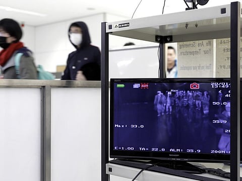 A monitor displays a thermographic image of passengers passing through a quarantine station at Narita Airport in Narita, Chiba Prefecture, Japan, on Thursday, Jan. 23, 2020. Chinese officials moved to halt travel from Wuhan, essentially locking down a city of 11 million people, as they try to stop the spread of a new SARS-like virus that’s already killed 17 and infected hundreds around the world. Photographer: Kiyoshi Ota/Bloomberg