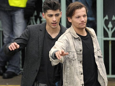 Zayn Malik and Louis Tomlinson. 