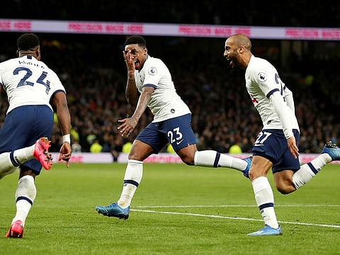 Tottenham Hotspur's Steven Bergwijn celebrates scoring their first goal with Serge Aurier and Lucas Moura