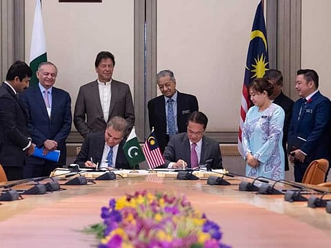 Pakistan Prime Minister Imran Khan and Malaysian Prime Minister Mahathir Mohamad witnessed signing of various agreements during Imran's visit o Malaysia.