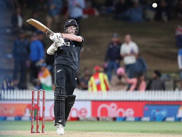New Zealand’s Mitchell Santner bats during the first ODI against India in Hamilton
