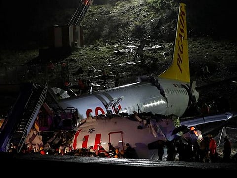 Pictures: Plane breaks into two after skidding off runway in Istanbul