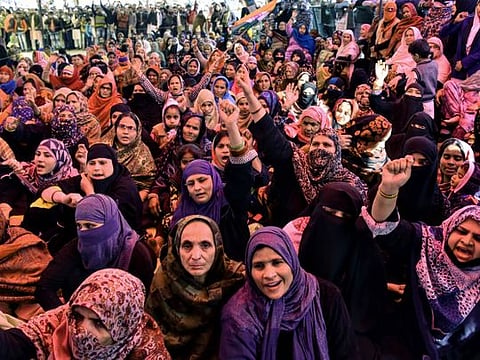 Women shout slogans against India's new citizenship law, during a protest at Shaheen Bagh area near the Jamia Millia Islamia University in New Delhi.