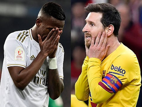 Vinicious of Real Madrid and Barcelona superstar Lionel Messi.