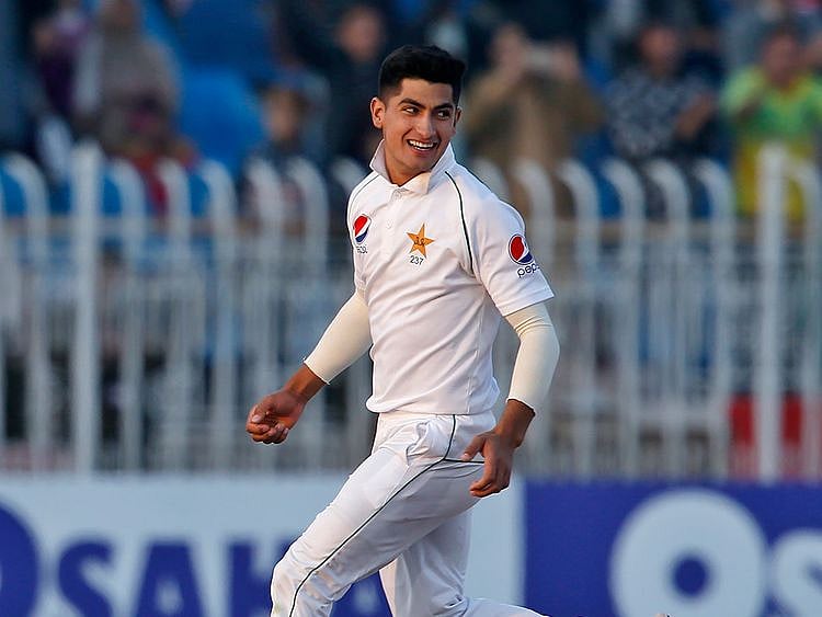 Pakistan pacer Naseem Shah celebrates after taking the wicket of Bangladesh batsman Mahmudullah during the third day of their 1st test cricket match at Rawalpindi cricket stadium in Rawalpindi, Pakistan, Sunday, Feb. 9, 2020. (AP Photo/Anjum Naveed)