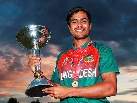 Bangladesh U19captain Akbar Ali poses with the World Cup trophy after defeating India by three wickets