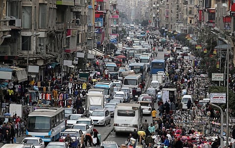 A general view shows a crowd and shops at Al Ataba, a market in central Cairo, Egypt February 10. Egypt's population has now reached 100 million and according to Aleksandar Bodiroza, representative of the UN, the pressure Egypt faces is acute. 
