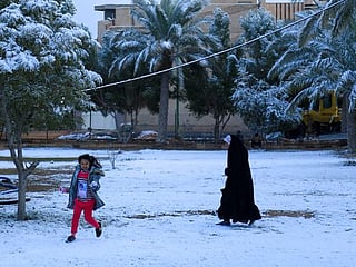 Photos: Residents of Baghdad wake up to rare snowfall