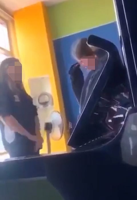 Screenshots of a video circulated on twitter that showed a girl in a local Dubai school getting bullied   