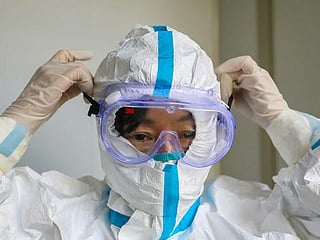 'Exhausted': Doctors at China's virus epicentre overworked and unprotected